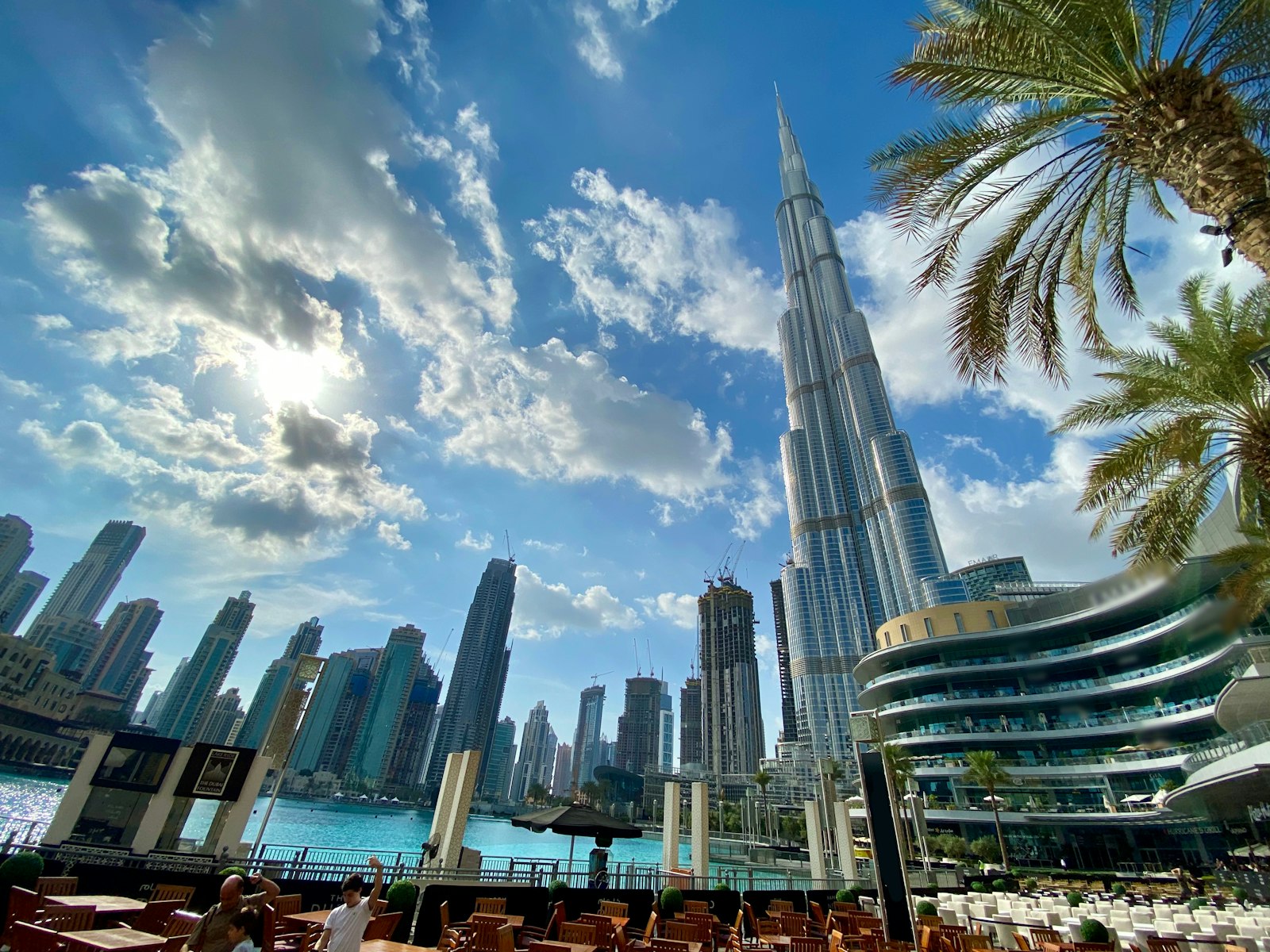 Burj Khalifa rising through low cloud over Downtown Dubai